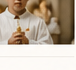 A child in prayer during the Corpus Christi celebration.